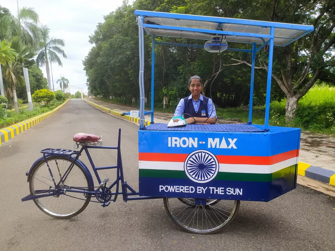 Vinisha Umashankar and her solar ironing cart. She came up with the idea when she was 12 — then worked with engineers to create a prototype. Now she's in Glasgow, Scotland, to speak at the COP26 climate change conference.