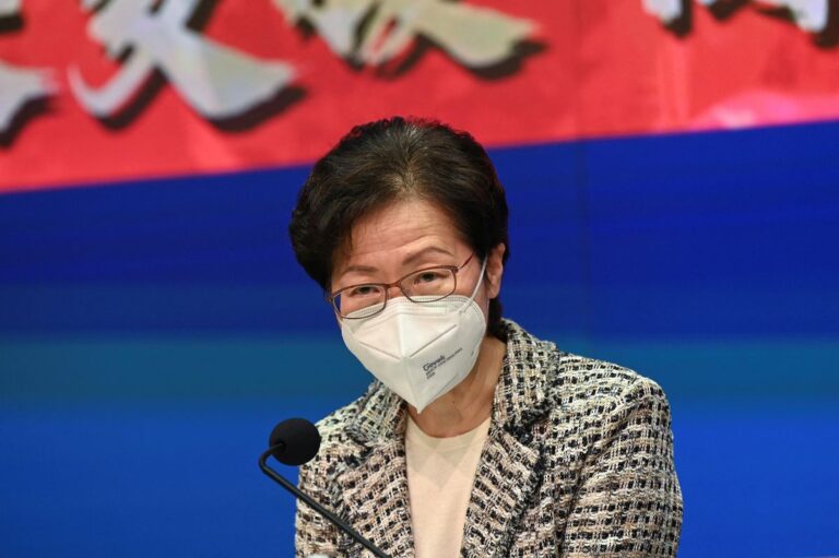 Hong Kong to lift strict COVID curbs after business backlash