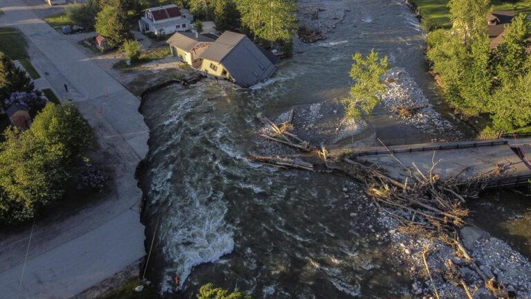 Floodwaters from Yellowstone National Park surge through eastern Montana
